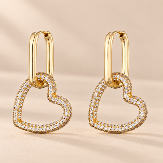 Amorette Heart Zircon Geometric Hoop Earrings — warm beige studio background