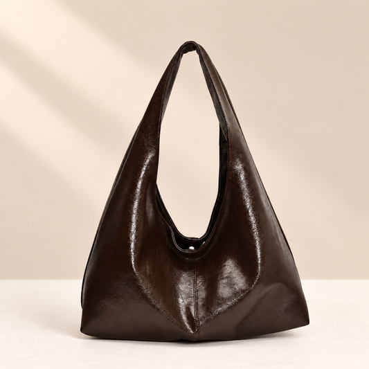 ElvaraHobo Shoulder Bag — warm beige studio background