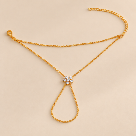 FloraLink Zircon Flower Finger Bracelet — warm beige studio background