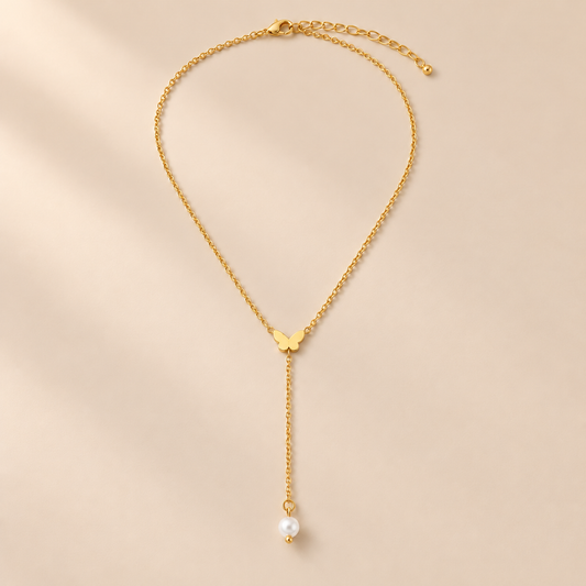 Aurelia Y-Drop Lariat Necklace — warm beige studio background