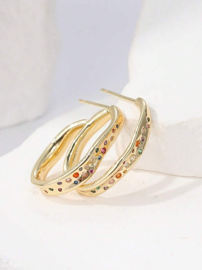 Arcelle 14K Gold-Plated Hoop Earrings – Rainbow Cubic Zirconia — Angled pair