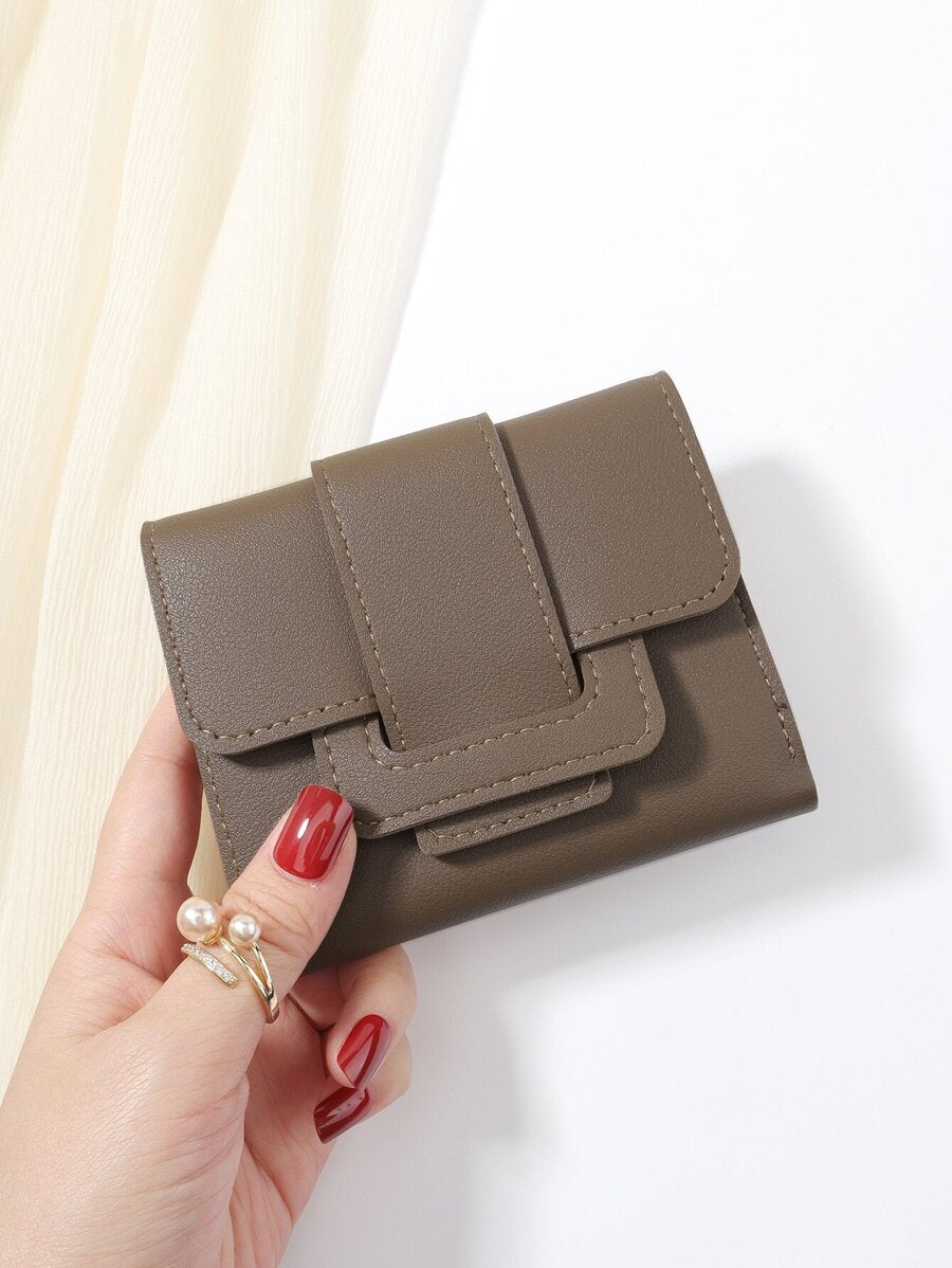 Camille Coffee Brown Trifold Wallet – Belt Detail & Card Slots — Wallet held in hand