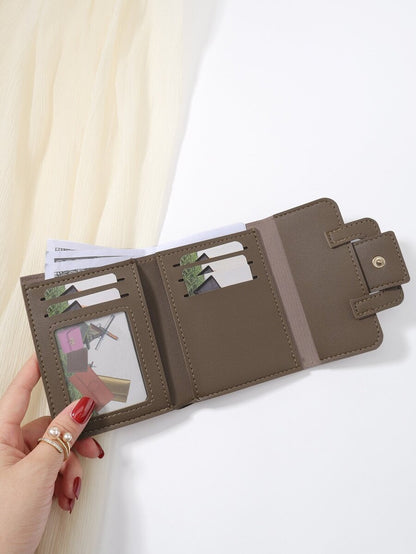 Camille Coffee Brown Trifold Wallet – Belt Detail & Card Slots — Open trifold and card slots; cards not included