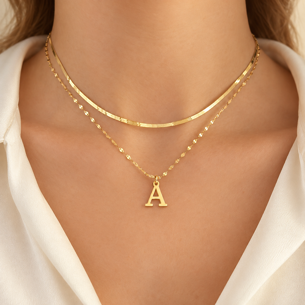 Elara gold layered necklace set with initial pendant