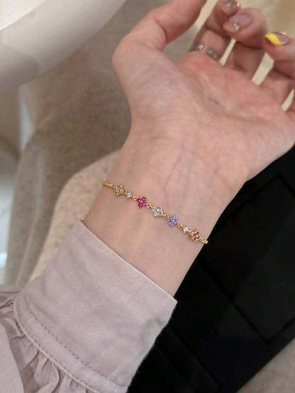 Fleurine 18K Gold-Plated Clover Bracelet – Multicolour Rhinestones — Worn on wrist