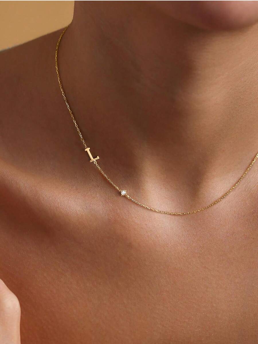 Leonie 14K Gold-Plated Initial Necklace – Sideways Letter & CZ — L initial worn view