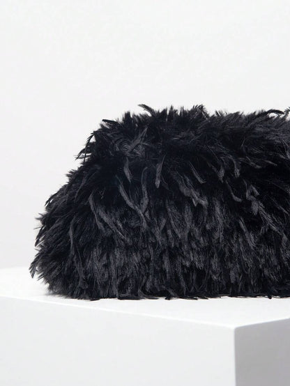Noélie Black Faux Fur Clutch – Soft Textured Evening Bag — Faux fur texture detail