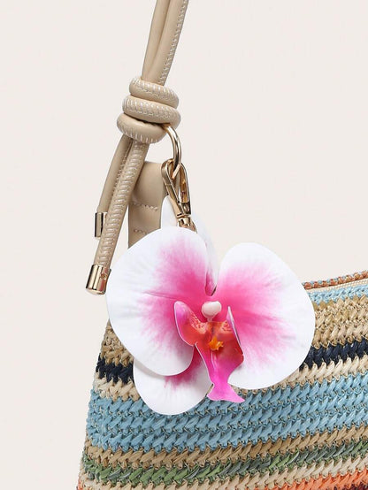 Orchidée Striped Shoulder Bag – Woven Texture & Flower Detail — Flower and strap detail