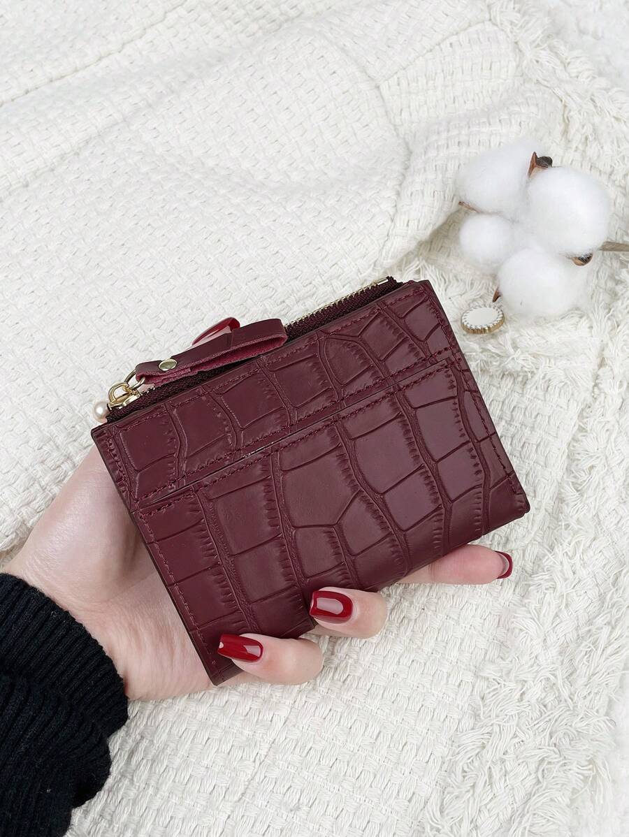 Ravelle Burgundy Croc-Effect Mini Wallet – Zip & Card Slots — Wallet held in hand