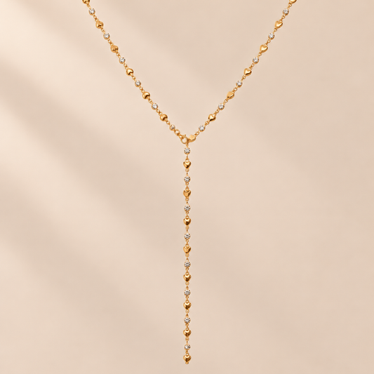Amourline 14K Gold-Plated Y Necklace — warm beige studio background