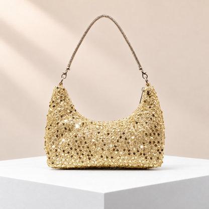 Seraphine Gold Sequin Shoulder Bag — white plinth, warm beige background