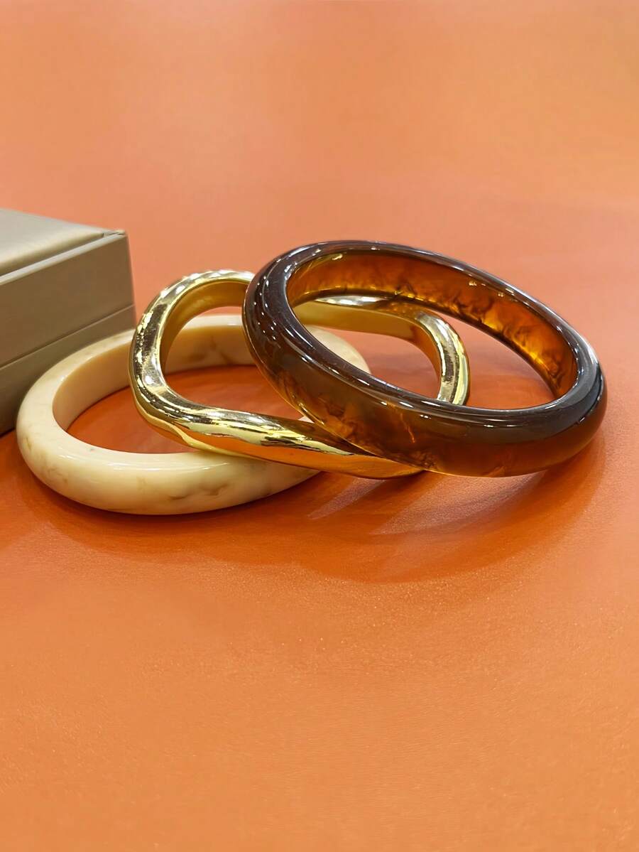 Sienne Three-Piece Bangle Set – Ivory, Gold Tone & Tortoiseshell — Three-piece set arranged flat