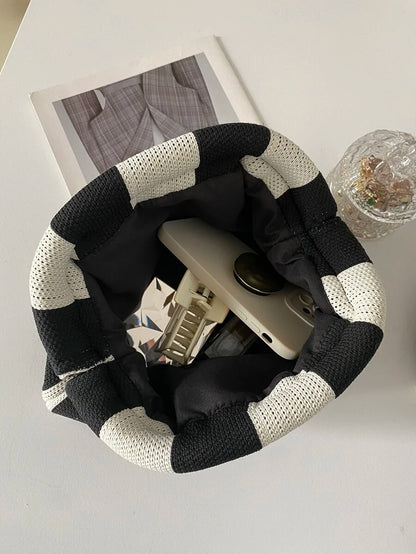 Solena Black & White Knitted Clutch – Striped Chain-Strap Bag — Open interior; accessories not included