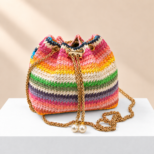Azmira Bohemian Woven Bucket Bag — white plinth, warm beige background