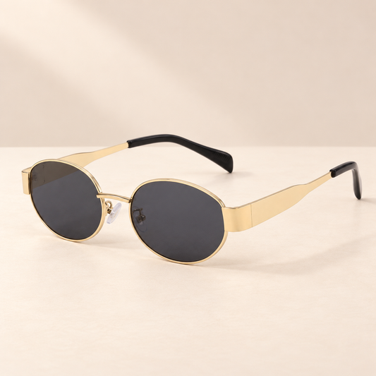 Virelle Retro Oval Sunglasses — Saint & Rose studio photograph on warm ivory background