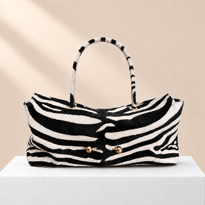 Zebrina Vintage Tote Bag — white plinth, warm beige background